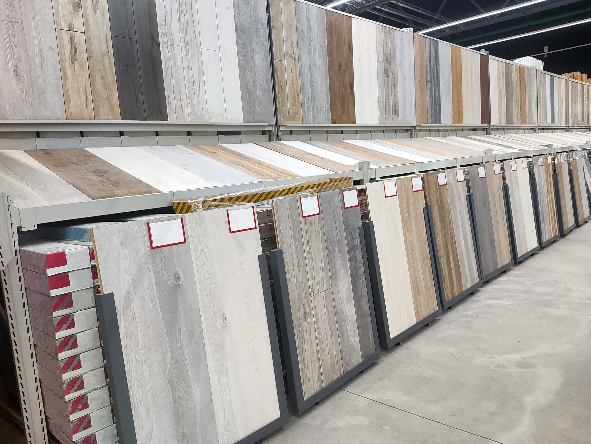 Selling laminate flooring in a building materials store, inside. Copy space for text
