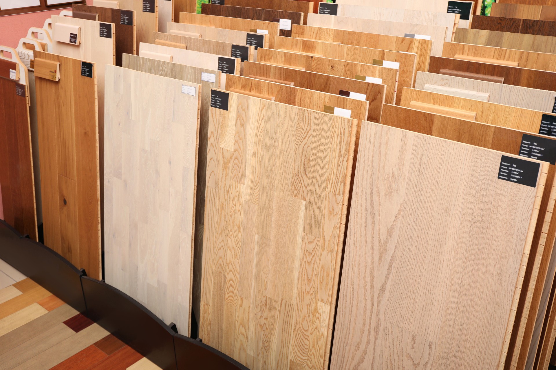 Many different samples of wooden flooring in store